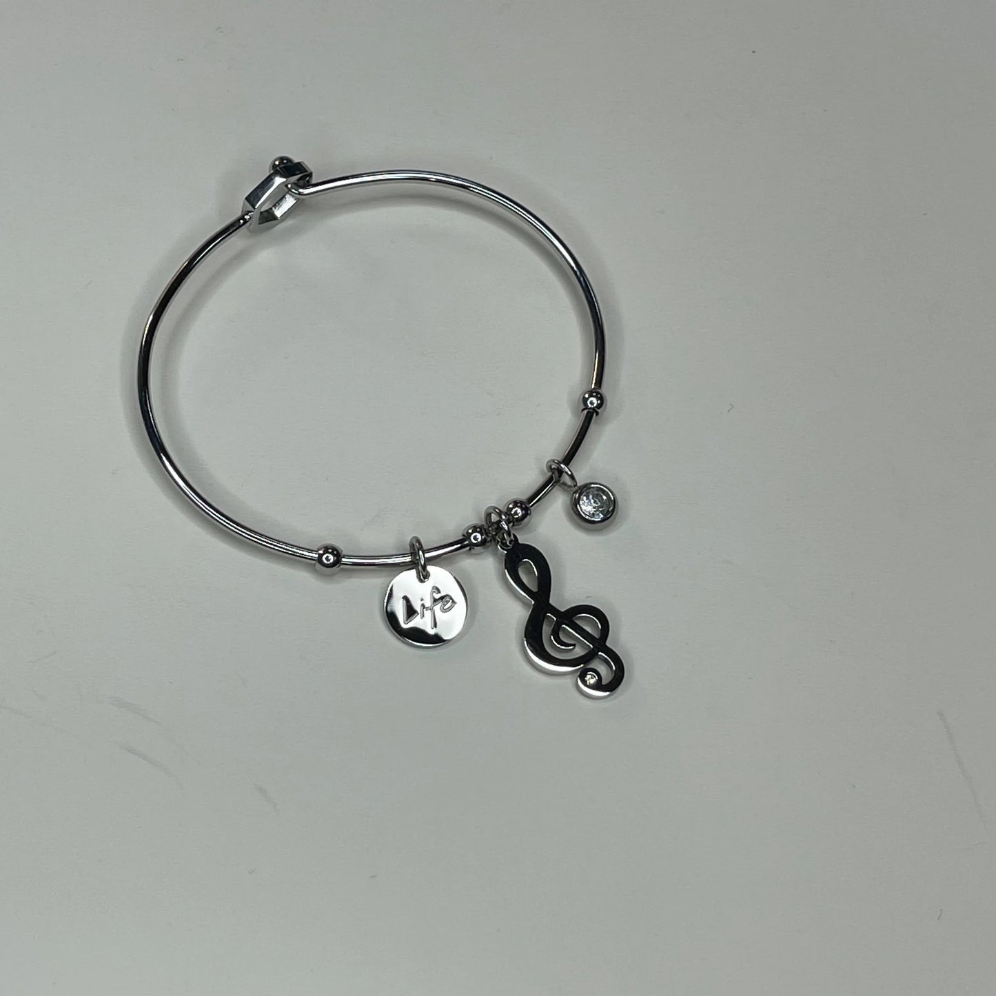 Bracciale Rigido Con Nota Musicale