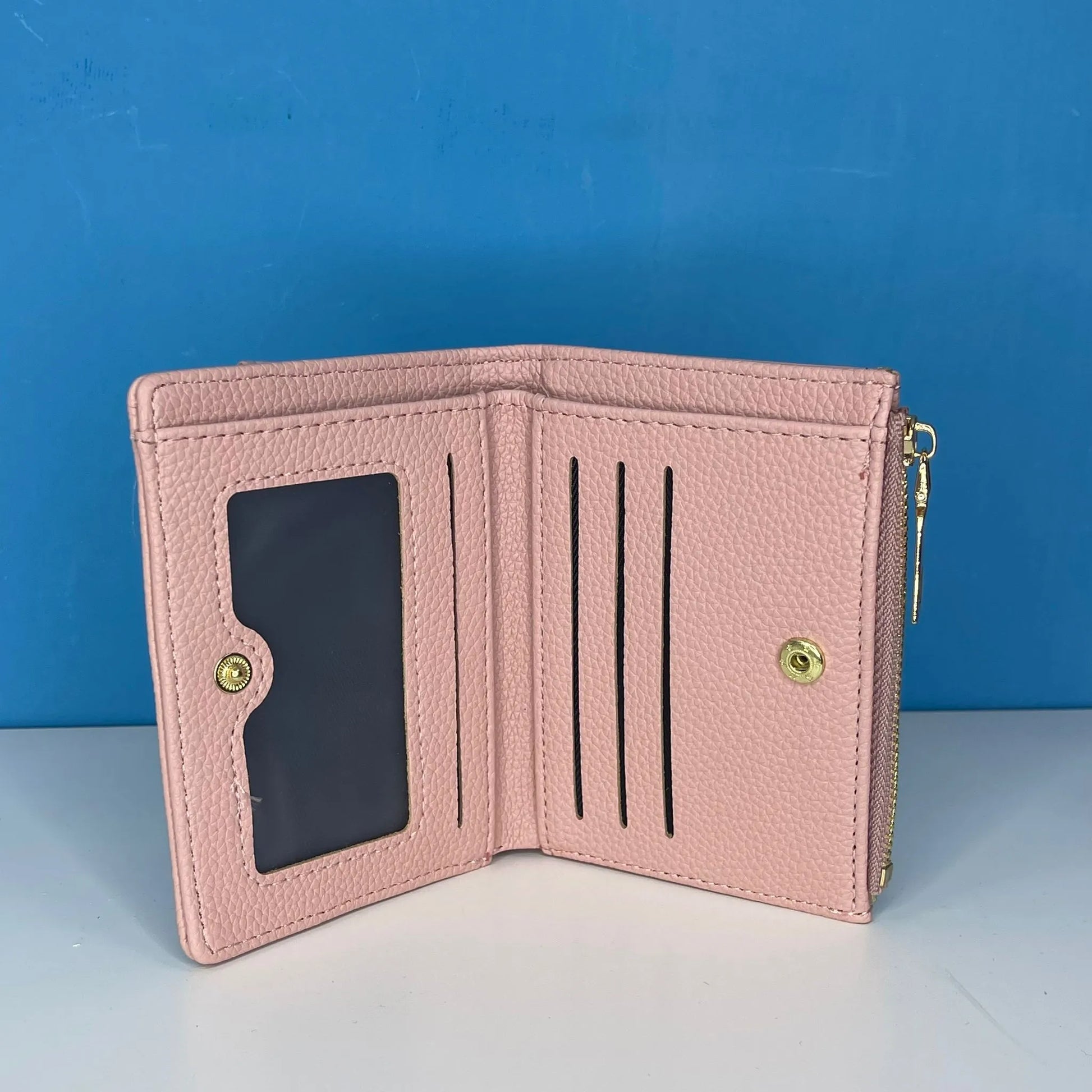 portafoglio donna piccolo di colore rosa aperto